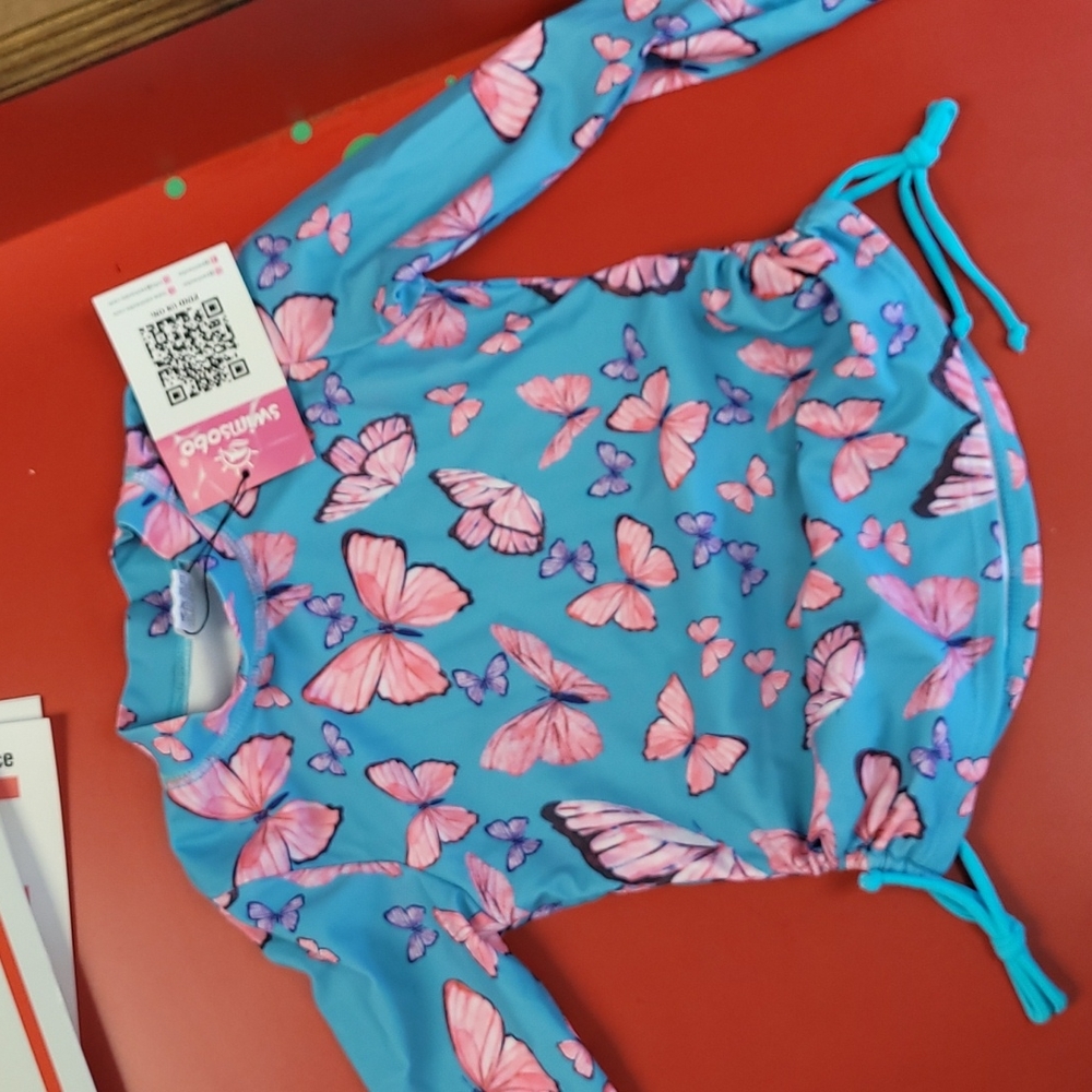 New Girl rash guard.